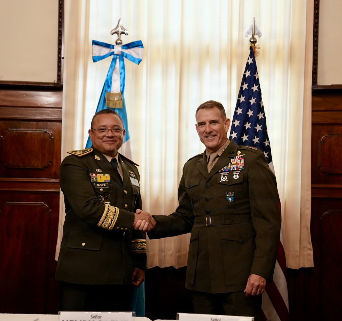 U.S. Marine Corps Gen. Francis L. Donovan, commander of U.S. Southern Command, right, shakes hands with Guatemalan Minister of National Defense Gen. Henry David Sáenz Ramos, left.