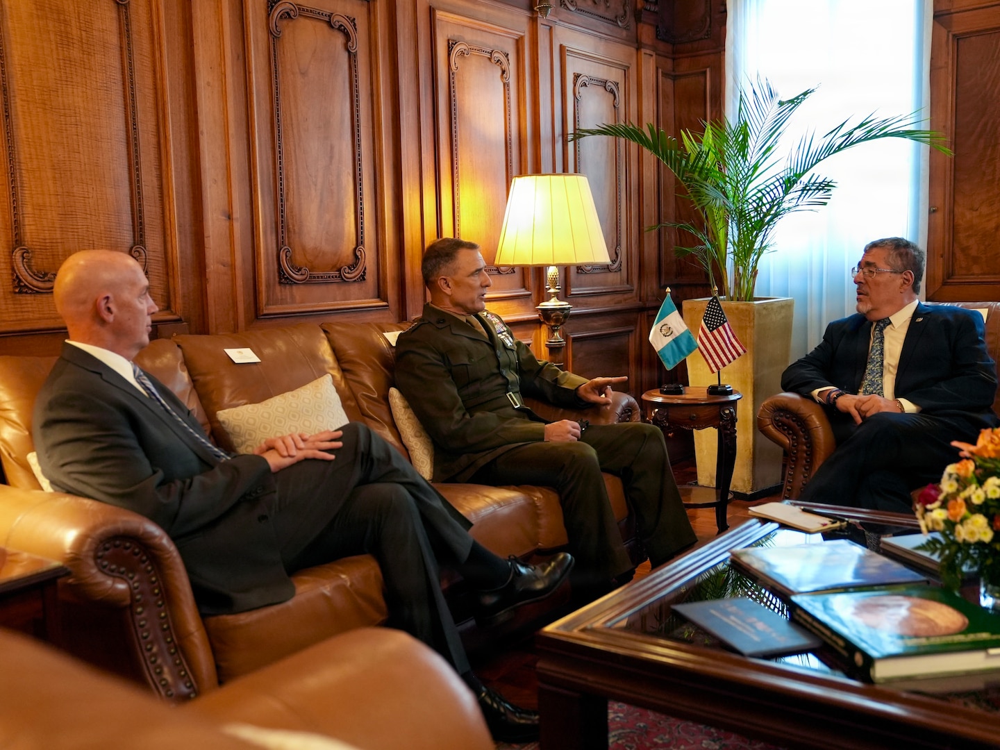 U.S. Marine Corps Gen. Francis L. Donovan, commander of U.S. Southern Command, middle, speaks with Guatemalan President Bernardo Arévalo, right, and U.S. Charge d’Affaires Jorgan Andrews, left.