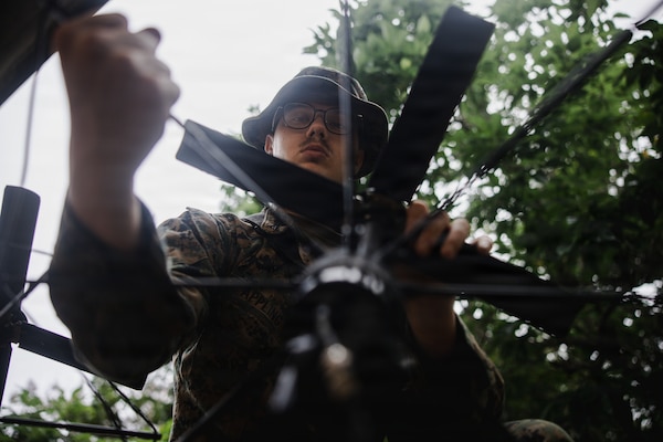 U.S. Marine Corps Lance Cpl. Caleb Appling, a native of Georgia and a transmissions systems operator with 7th Communication Battalion, III Marine Expeditionary Force Information Group, sets up a portable multi-band tactical antenna system during Kaiju Rain 26 at Camp Hansen, Okinawa, Japan, May 10, 2026.
