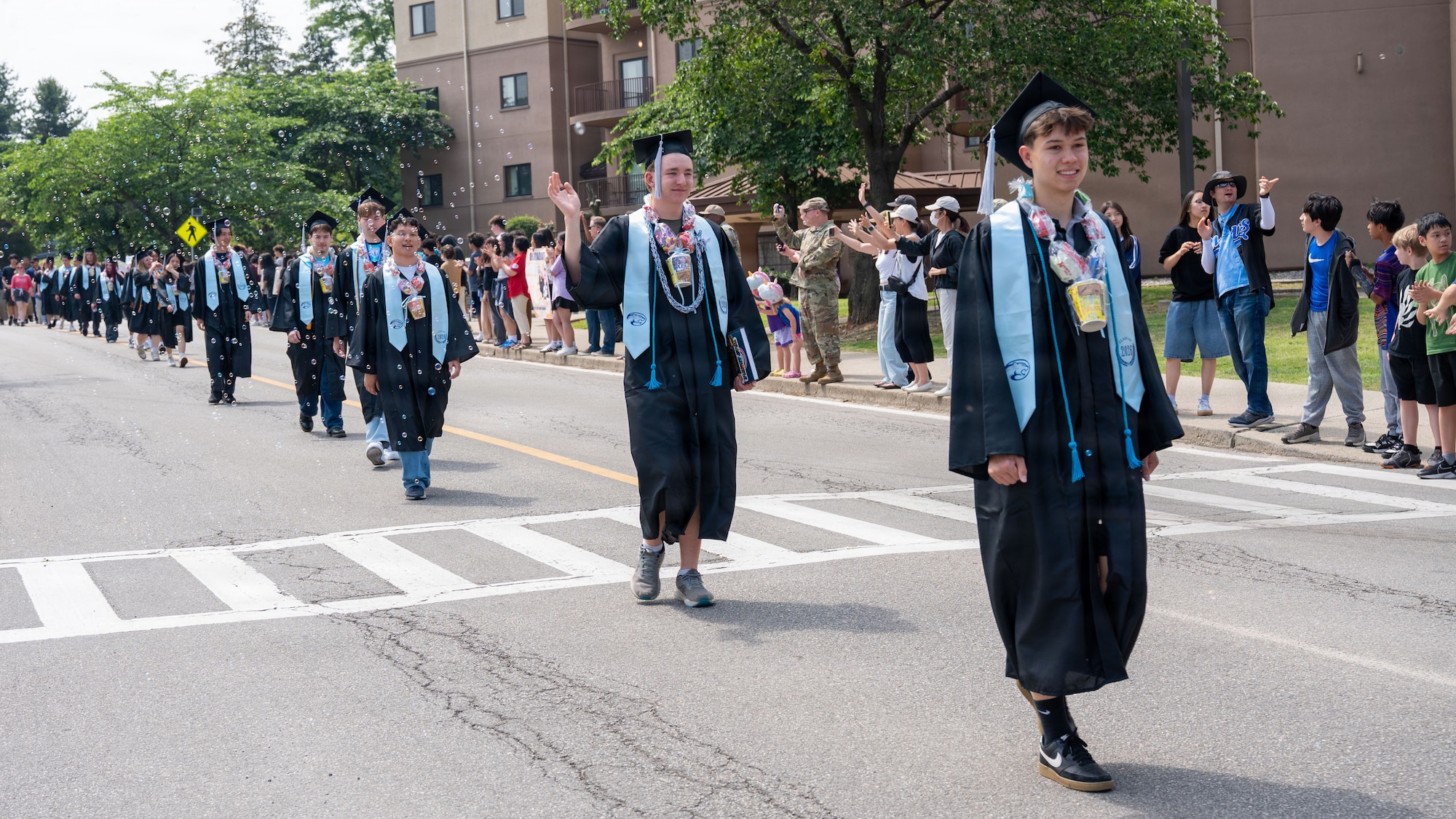 Students attend graduation parade.