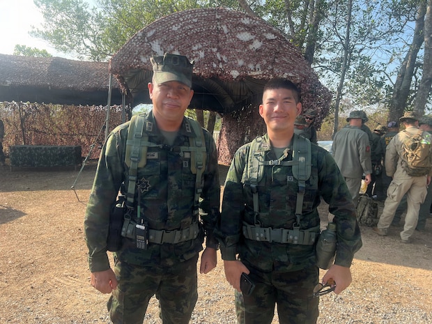 Cmdr. Suban Songsawas and LT. j.g.Nuttachid Tuntha, both with the Royal Thai Marine Corps Division, prepare to track force movements using Tactical Assault/Team Awareness kits placed on armored vehicles at the combined arms live-fire exercise during Exercise Cobra Gold 2026, in Ban Chan Khrem, Chanthaburi province, Thailand, March 6, 2026.