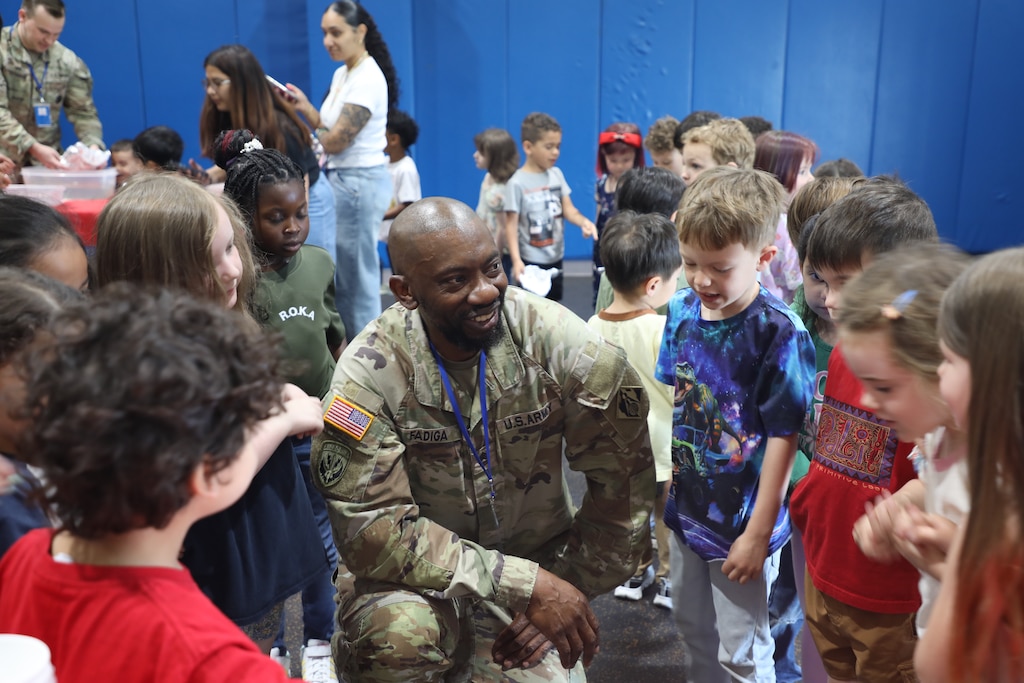 Sgt. 1st Class Ahmed Fadiga, Contracting NCOIC, U.S. Army Corps of Engineers – Far East District, engages with students during a Science, Technology, Engineering, Arts and Mathematics (STEAM) event at Humphreys West Elementary School on Camp Humphreys, South Korea, May 18, 2026. The event provided students opportunities to interact directly with engineering professionals while exploring scientific concepts through engaging activities and demonstrations. (U.S. Army photo by Yohan An)