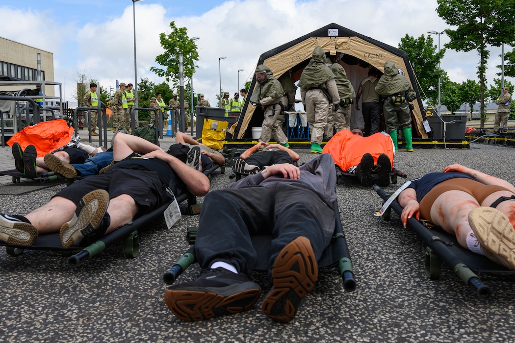 Simulated casualties lay on the stretchers.