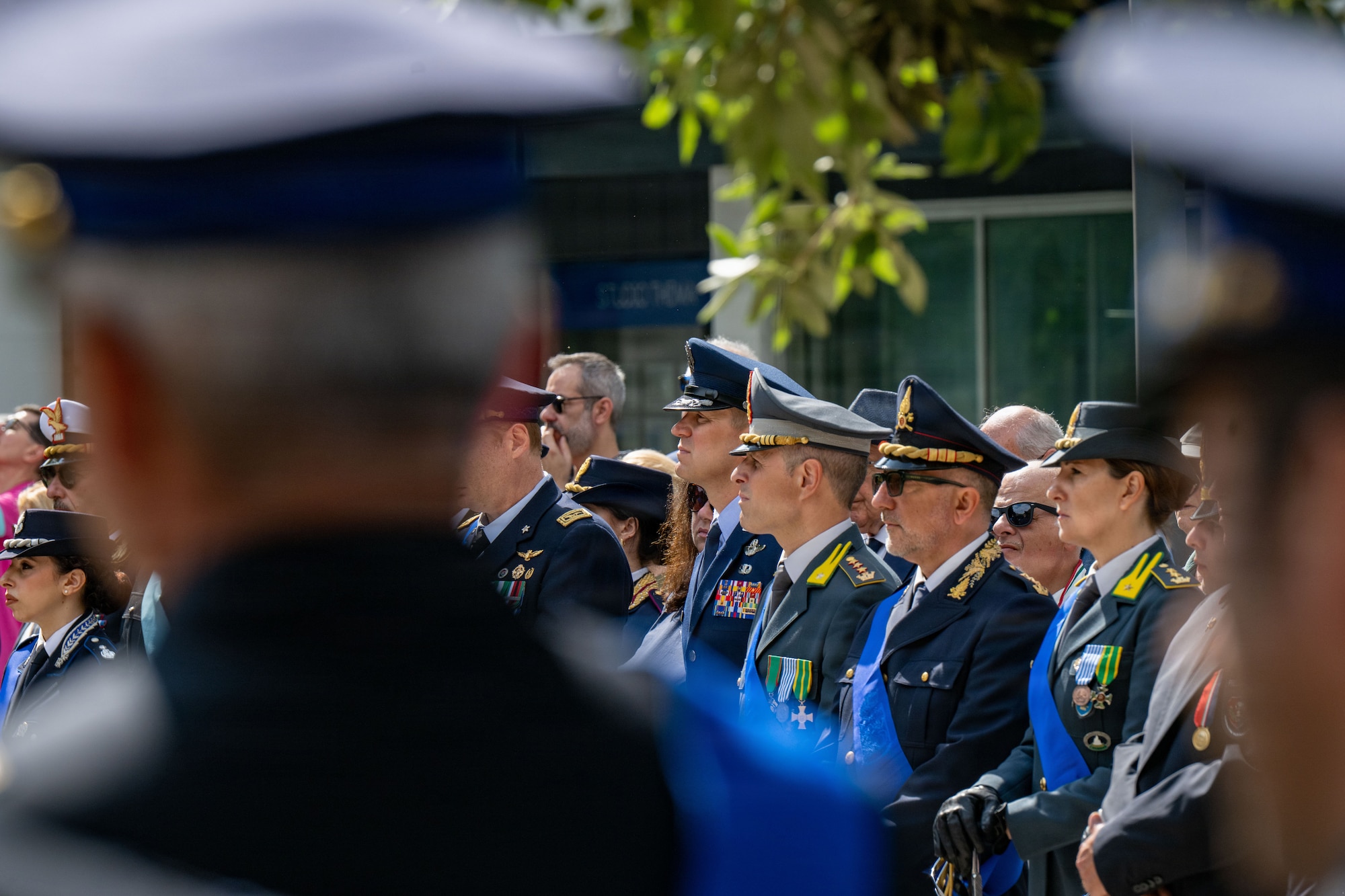 Men in military uniform stand together