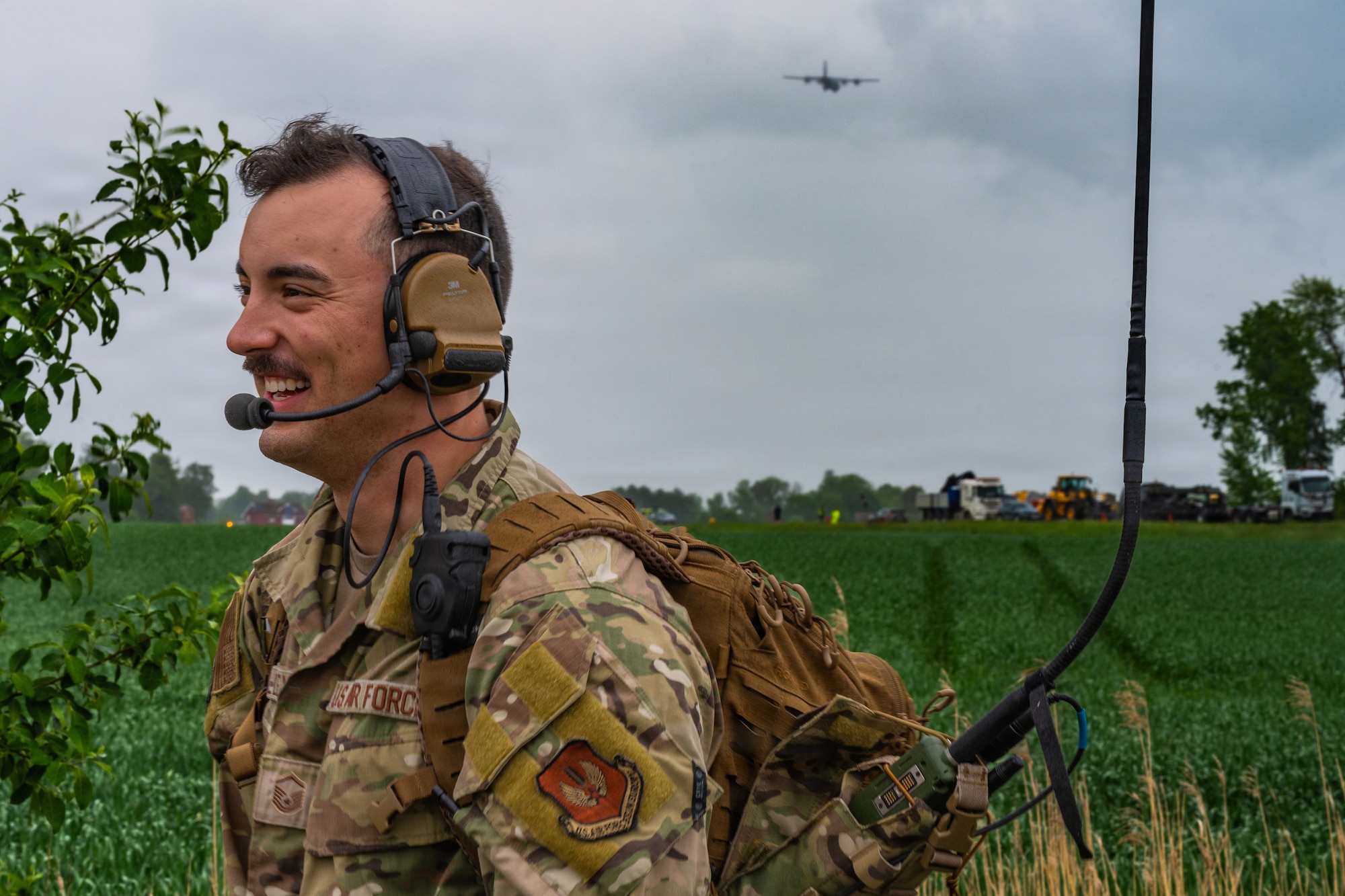A photo of an Airman looking at an aircraft