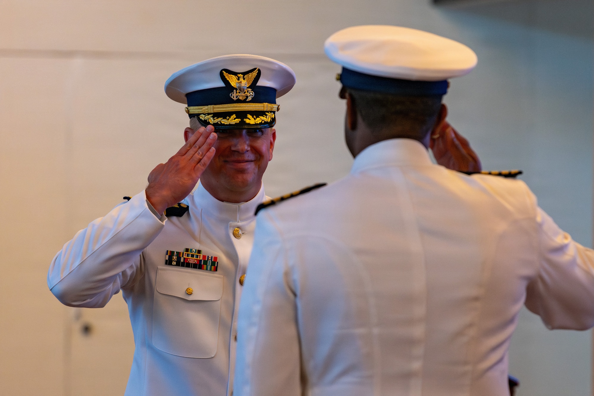 The incoming commander salutes to the outgoing commander.