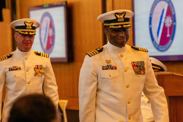The incoming and outgoing commanders walk to conduct a crew inspection.