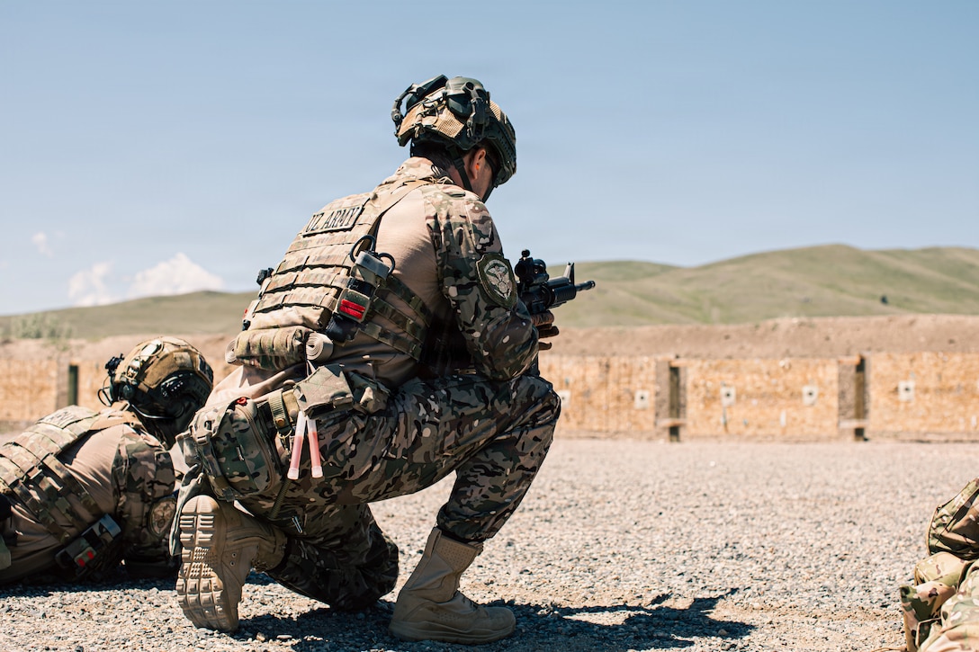 An Uzbek partner prepares to engage practice targets during M4 carbine familiarization training at Fort Harrison, Montana, June 3, 2026, as part of exercise Regional Cooperation 2026. Regional Cooperation 2026 is an annual, multinational U.S. Central Command-sponsored command-post, field training and cyber defense exercise conducted by U.S. National Guard units in partnership with nations from Central and South Asia, and other participating nations. (Oklahoma National Guard photo by Sgt. Anthony Ackah-Mensah)