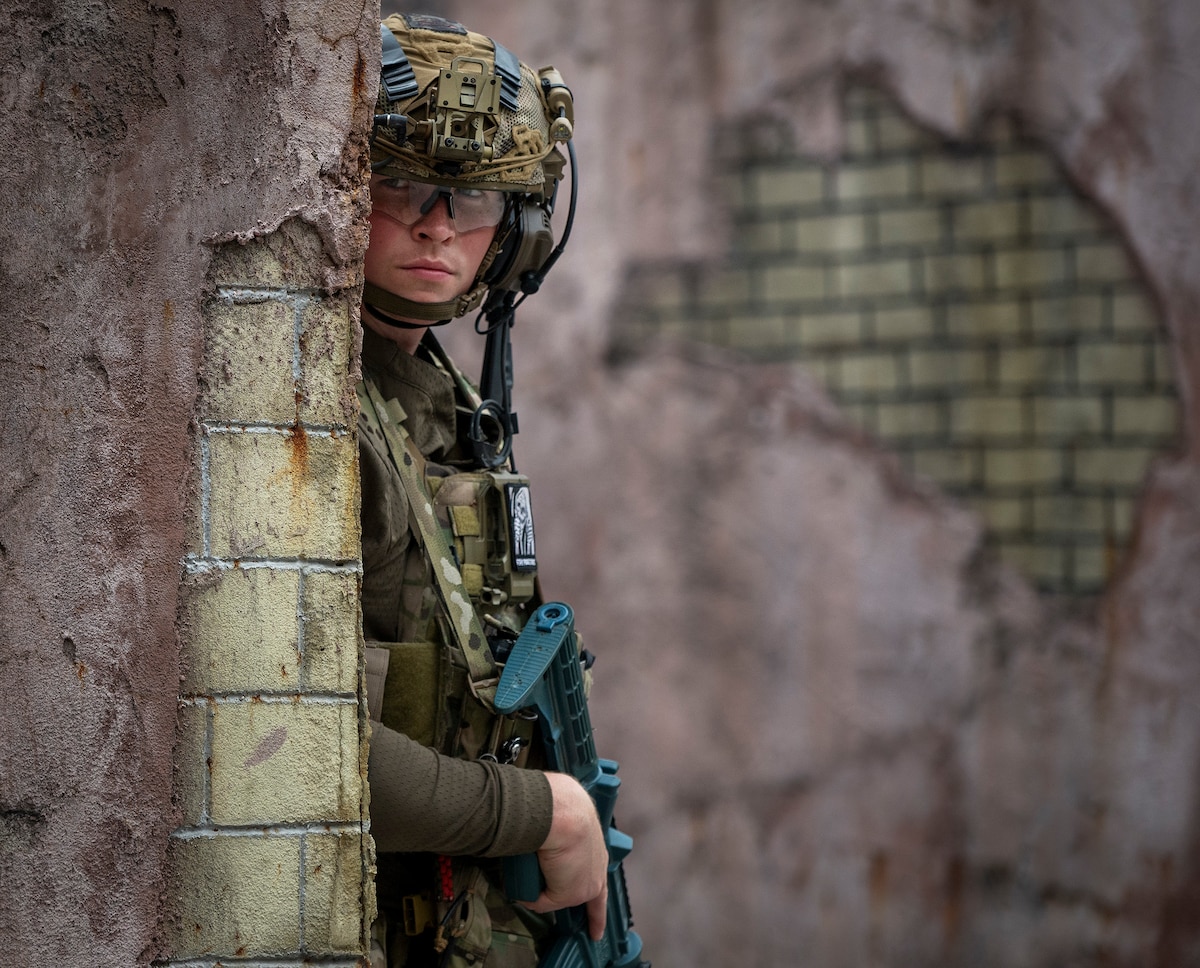 Senior Airman Travis Huffman, an explosive ordnance disposal technician assigned to the 92nd Civil Engineer Squadron, observes his team maneuver during the 96th Test Wing-hosted Explosive Ordnance Disposal Warfighter event at Eglin Air Force Base, Fla., May 6, 2026. The two-week exercise focused on current challenges and mission-relevant training for the explosive ordnance disposal career field. (U.S. Air Force photo by Samuel King Jr.)