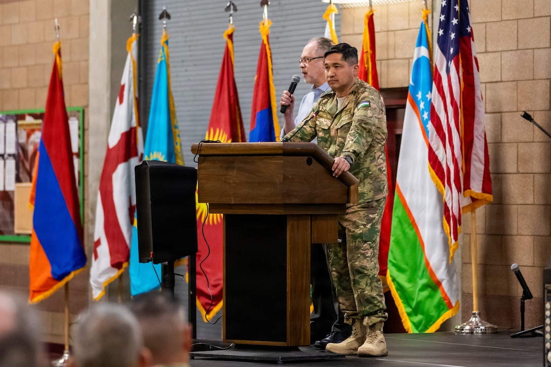 An Uzbekistan senior representative delivers remarks during the opening ceremony of exercise Regional Cooperation 2026 at Fort Harrison, Montana, June 1, 2026. Marking the 30th iteration of the exercise, Regional Cooperation 2026 brings together more than 350 military personnel from 10 countries to strengthen interoperability, enhance regional security, and build enduring partnerships. (U.S. Army National Guard photo courtesy of the 103rd Public Affairs Detachment)