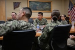 U.S. Navy Bureau of Medicine and Surgery Force Master Chief Jerry Cantorna, director, U.S. Navy Hospital Corps, center, and Master Chief Hospital Corpsman Dante Cooley, deputy director, U.S. Navy Hospital Corps, receive a command briefing from Navy Medicine Training Support Command (NMTSC) leadership during a visit, June 2, 2026. Cantorna’s visit to NMTSC emphasized Navy Medicine’s focus on the health, warfare, and training of Sailors and Marines. (U.S. Navy photo Mass Communication Specialist 1st Class Shayla D. Hamilton)
