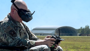 Airmen assigned to the 184th Wing’s Point Defense Battle Lab-Kansas and the 319th Reconnaissance Wing’s PDBL-North Dakota coordinate operational scenarios during the Valuable Asset Protection Operations Rehearsal (VAPOR) 26.1 at Avon Park Air Force Test Range, Florida, March 22-April 2, 2026. VAPOR 26.1 is a joint, Total Force exercise evaluating non-kinetic, passive defense measures—such as camouflage, concealment, deception, and hardening—to protect vital Air Force assets from small Unmanned Aircraft Systems (sUAS). The rehearsal supports Air Combat Command's initiative to shift the military toward a proactive defensive posture, enhancing installation survivability and mission readiness.
