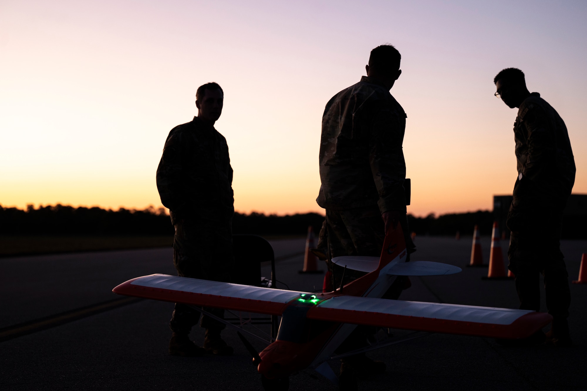 Airmen assigned to the 184th Wing’s Point Defense Battle Lab-Kansas and the 319th Reconnaissance Wing’s PDBL-North Dakota coordinate operational scenarios during the Valuable Asset Protection Operations Rehearsal (VAPOR) 26.1 at Avon Park Air Force Test Range, Florida, March 22-April 2, 2026. VAPOR 26.1 is a joint, Total Force exercise evaluating non-kinetic, passive defense measures—such as camouflage, concealment, deception, and hardening—to protect vital Air Force assets from small Unmanned Aircraft Systems (sUAS). The rehearsal supports Air Combat Command's initiative to shift the military toward a proactive defensive posture, enhancing installation survivability and mission readiness.