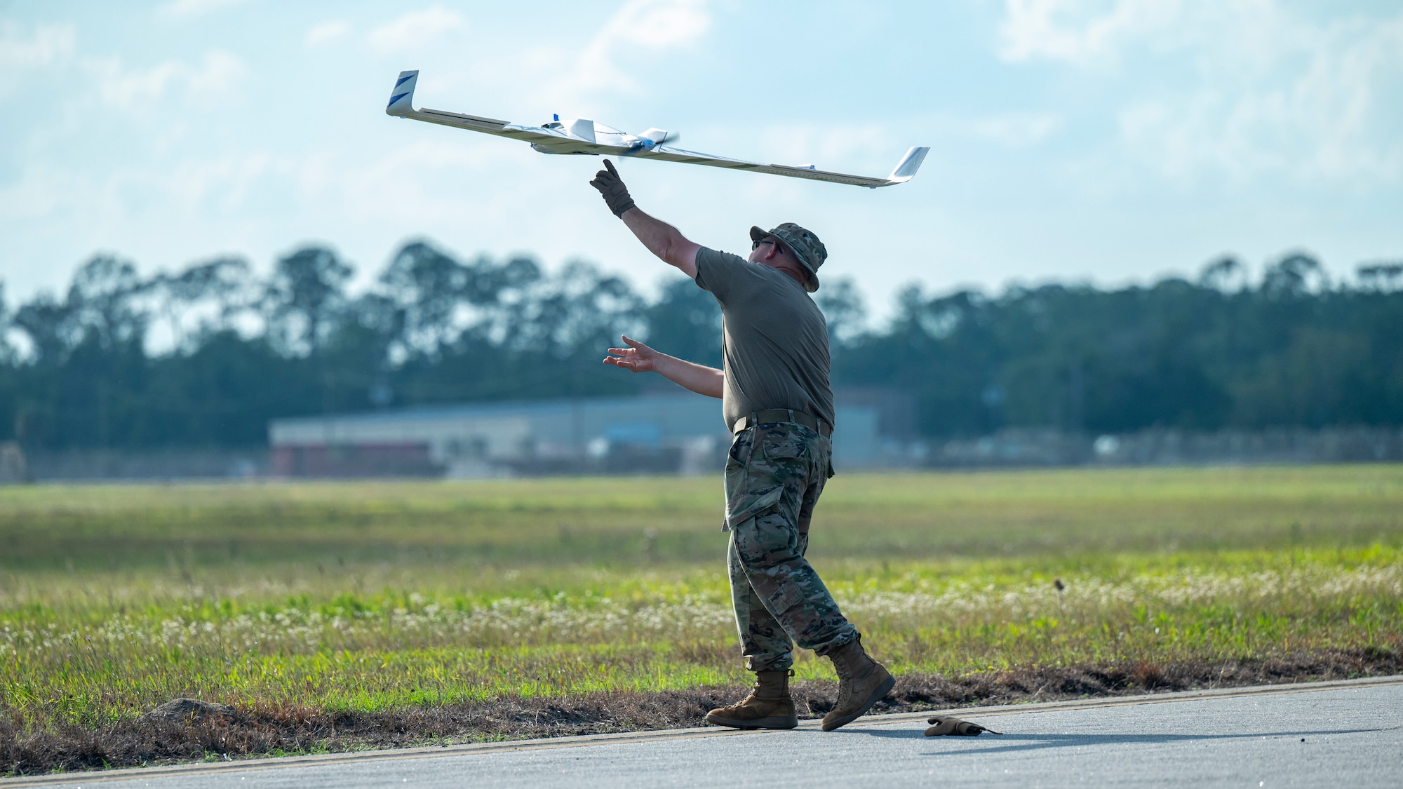 Airmen assigned to the 184th Wing’s Point Defense Battle Lab-Kansas and the 319th Reconnaissance Wing’s PDBL-North Dakota coordinate operational scenarios during the Valuable Asset Protection Operations Rehearsal (VAPOR) 26.1 at Avon Park Air Force Test Range, Florida, March 22-April 2, 2026. VAPOR 26.1 is a joint, Total Force exercise evaluating non-kinetic, passive defense measures—such as camouflage, concealment, deception, and hardening—to protect vital Air Force assets from small Unmanned Aircraft Systems (sUAS). The rehearsal supports Air Combat Command's initiative to shift the military toward a proactive defensive posture, enhancing installation survivability and mission readiness.