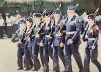 Then-U.S. Air Force Junior Reserve Officer Training Corps Cadet Kelli R. Moon, far right, leads the drill team at Belton-Honea Path High School, Honea Path, South Carolina in 1997. Moon retired from the Air Force as a colonel in 2026 after 25 years of service and credited her JROTC experience with igniting her interest in an Air Force career. (Courtesy photo provided by Col. Moon)
