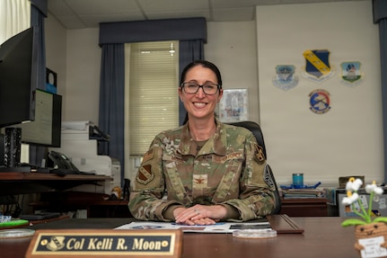 U.S. Air Force Col. Kelli R. Moon, commander of the 11th Operations Group at Joint Base Anacostia-Bolling, sits at her desk at JBAB, Washington, D.C. May 27, 2026. Moon has commanded the 11th Operations Group at JBAB since 2024, which oversees the U.S. Air Force Honor Guard, U.S. Air Force Band, Air Force Chaplaincy at Arlington National Cemetery, and the Air Force Memorial.  (U.S. Air Force photo by Senior Airman Shanel Toussaint)