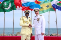 U.S. Navy Rear Adm. Scott W. Ruston, right, Vice Commander of U.S. Naval Forces Africa, shakes hands with Nigerian Navy Rear Adm. Abubakar Abdullahi Mustapha, Flag Officer Commanding of the Western Naval Command, at the International Fleet Review during the Nigerian Navy’s 70th Anniversary Celebration at the Eko Atlantic City Waterfront in Lagos, Nigeria, June 1, 2026.