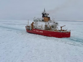 U.S. Coast Guard Cutter Mackinaw (WLBB 30) crew conducts track maintenance during a joint exercise with another crew U.S. Coast Guard Air Station Traverse City on the St. Mary's River, Feb. 5, 2026. The Mackinaw was clearing ice in support of Operation Taconite, which aids the flow of commerce during the winter months on the Great Lakes. (U.S. Coast Guard photo by Commander Andrew Lund)