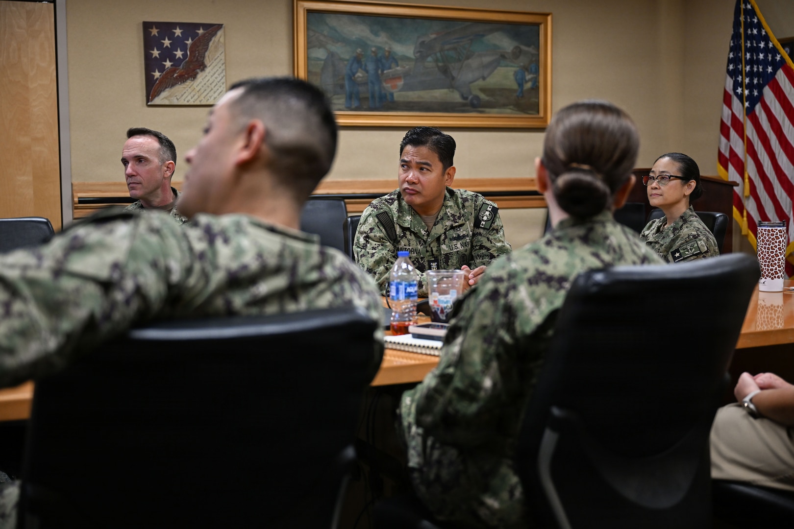 U.S. Navy Bureau of Medicine and Surgery Force Master Chief Jerry Cantorna, director, U.S. Navy Hospital Corps, center, and Master Chief Hospital Corpsman Dante Cooley, deputy director, U.S. Navy Hospital Corps, receive a command briefing from Navy Medicine Training Support Command (NMTSC) leadership during a visit, June 2, 2026. Cantorna’s visit to NMTSC emphasized Navy Medicine’s focus on the health, warfare, and training of Sailors and Marines. (U.S. Navy photo Mass Communication Specialist 1st Class Shayla D. Hamilton)