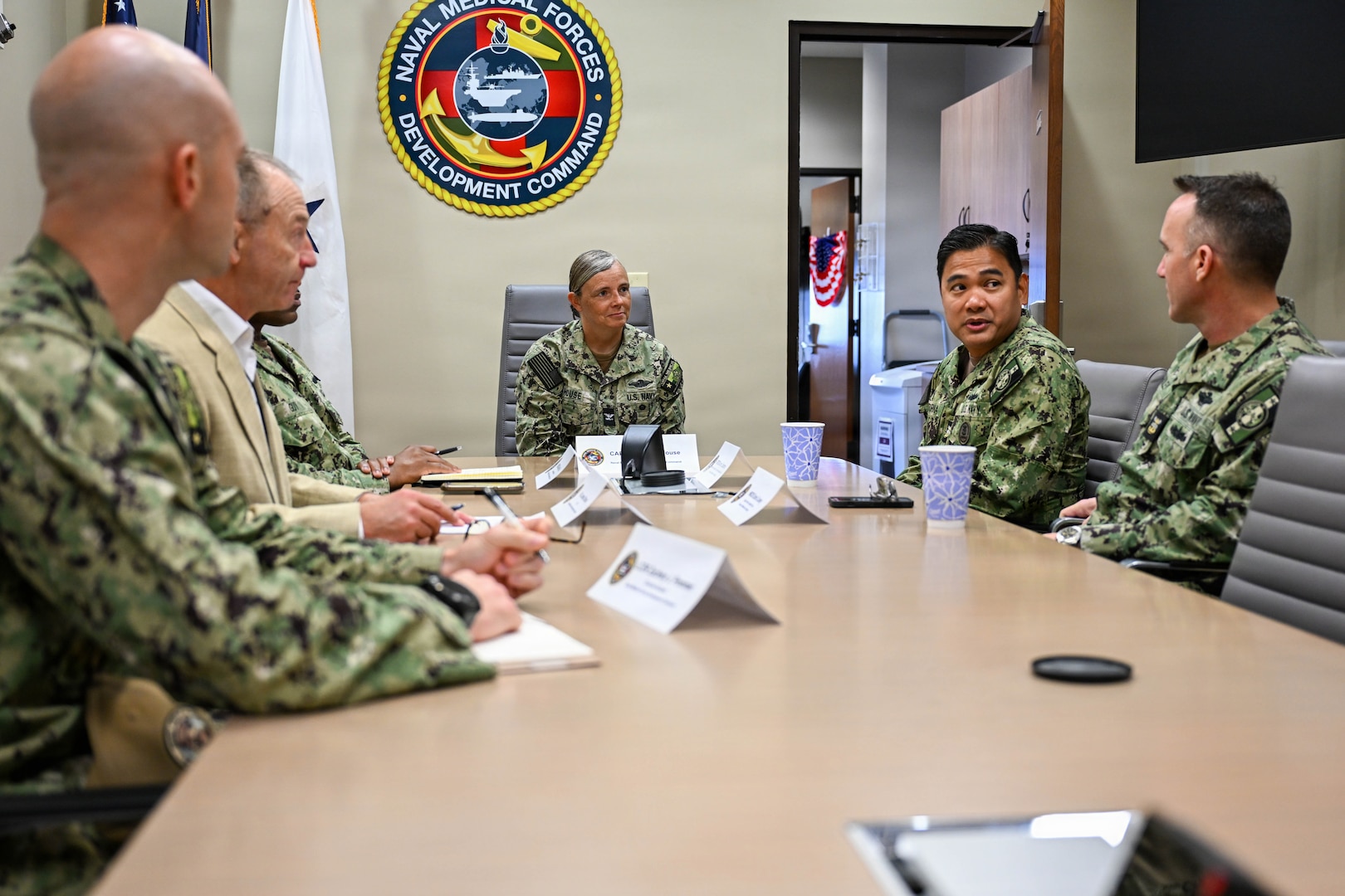 U.S. Navy Bureau of Medicine and Surgery Force Master Chief Jerry Cantorna, director, U.S. Navy Hospital Corps, and Master Chief Hospital Corpsman Dante Cooley, deputy director, U.S. Navy Hospital Corps, meet with Naval Medical Forces Development Command (NMFDC) leadership during a visit to the headquarters building, June 1, 2026. Cantorna’s visit to NMFDC emphasized Navy Medicine’s focus on the health, warfare, and training of Sailors and Marines. (U.S. Navy photo Mass Communication Specialist 1st Class Shayla D. Hamilton)