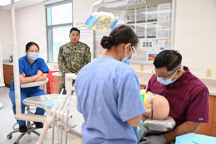 U.S. Navy Bureau of Medicine and Surgery Force Master Chief Jerry Cantorna, director, Hospital Corps, observes Navy dental assistant program students at the Medical Education and Training Campus during a visit to Navy Medicine Training Support Command, June 2, 2026. Cantorna’s visit to NMTSC emphasized Navy Medicine’s focus on the health, warfare, and training of Sailors and Marines.  (U.S. Navy photo Mass Communication Specialist 1st Class Shayla D. Hamilton)
