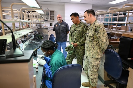 U.S. Navy Bureau of Medicine and Surgery Force Master Chief Jerry Cantorna, director, Hospital Corps, observes Navy dental laboratory students at the Medical Education and Training Campus during a visit to Navy Medicine Training Support Command, June 2, 2026. Cantorna’s visit to NMTSC emphasized Navy Medicine’s focus on the health, warfare, and training of Sailors and Marines. (U.S. Navy photo Mass Communication Specialist 1st Class Shayla D. Hamilton)