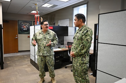 U.S. Navy Chief Hospital Corpsman Timothy O’Neal, leading chief petty officer, operations and plans division, speaks to U.S. Navy Bureau of Medicine and Surgery Force Master Chief Jerry Cantorna, director, U.S. Navy Hospital Corps, during a visit to Naval Medical Forces Development Command (NMFDC), June 1, 2026. Cantorna’s visit to NMFDC emphasized Navy Medicine’s focus on the health, warfare, and training of Sailors and Marines. (U.S. Navy photo Mass Communication Specialist 1st Class Shayla D. Hamilton)