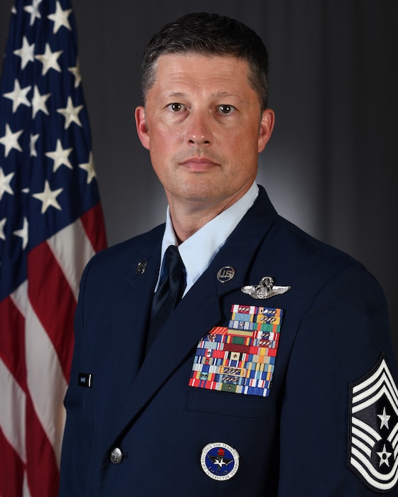 Official photo of Chief Master Sgt. Joshua J. Moore, 1st Special Operations Wing Command Chief Master Sergeant.