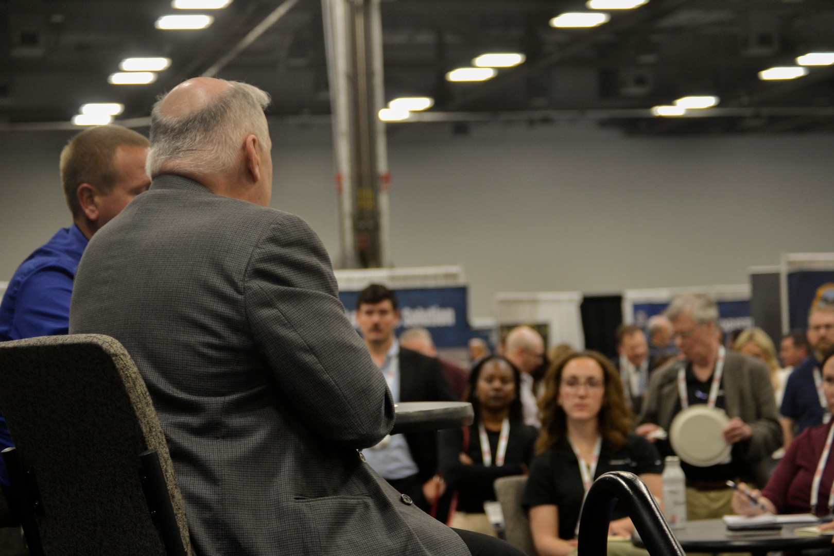 Industry and government logistics professionals listen as DLA Troop Support leadership answers questions during a "knowledge bar" session at the DLA Supply Chain Alliance Symposium & Exhibition in Columbus, Ohio, June 3, 2026. The interactive setting allowed small and large businesses to gain direct insights into doing business with the agency.