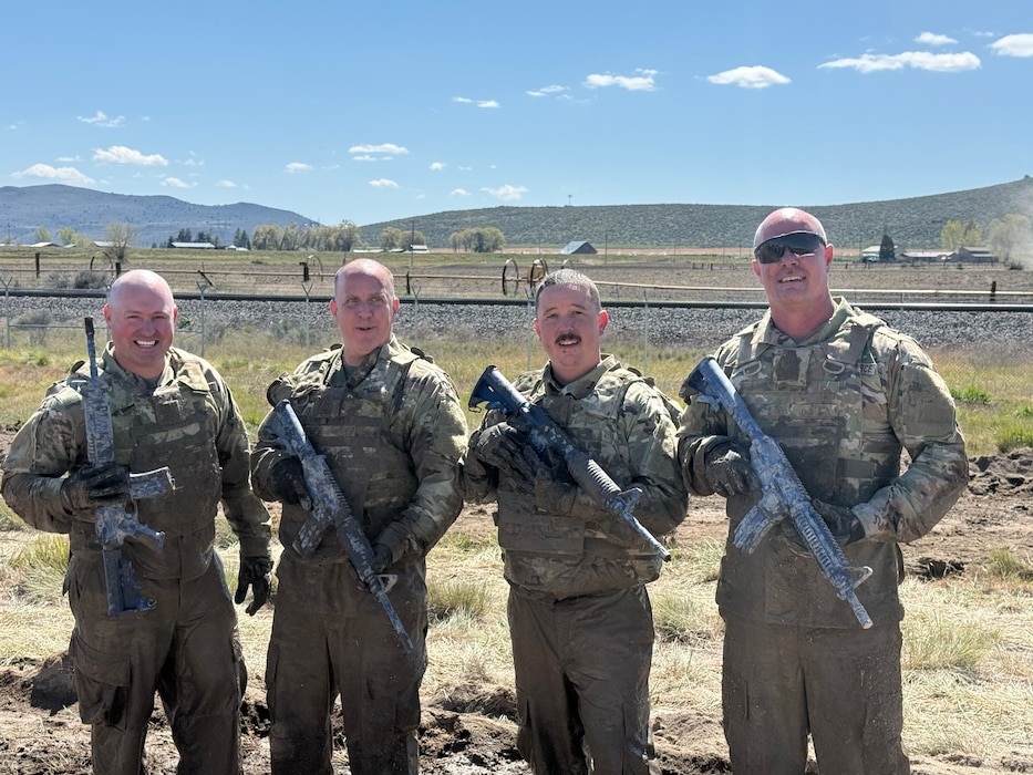 Four people pose for a picture