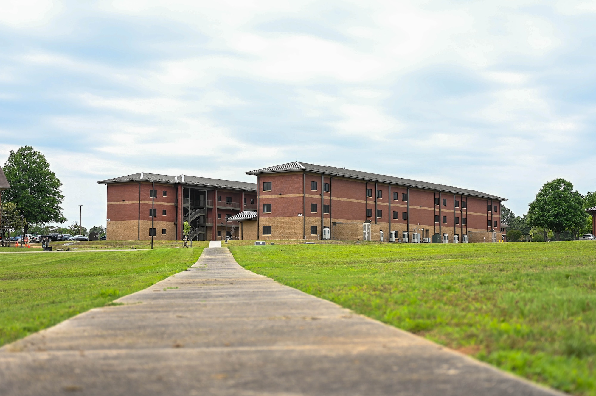 Two of the new dormitory buildings stand tall.