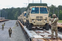 116th Mobile Brigade Combat Team unload vehicles and equipment from railcars June 3, 2026, at Fort Polk, Louisiana.