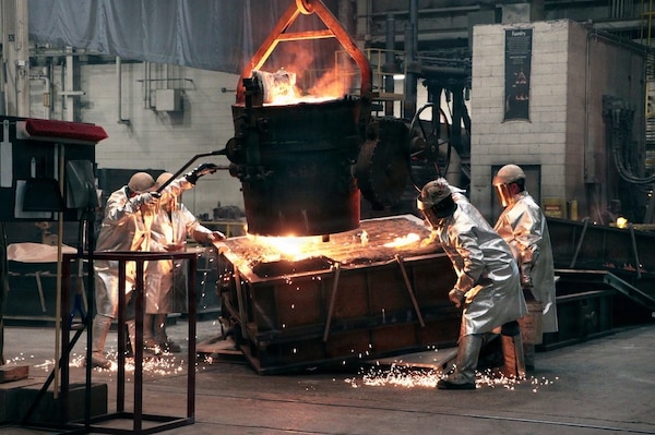 Molten metal fills molds on the foundry floor at Joint Manufacturing and Technology Center in Rock Island Arsenal, Illinois, April 23, 2026.