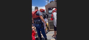 Crew members assigned to Coast Guard Station Maui in Wailuku, Hawaii, assist 21 passengers aboard a disabled vessel near Maalaea Harbor, May 28, 2026. A 45-foot Response Boat-Medium crew embarked 21 passengers from the charter vessel Maui Diamond after its engines became disabled and emitted smoke while transiting to the harbor. (U.S. Coast Guard video courtesy Coast Guard Station Maui)