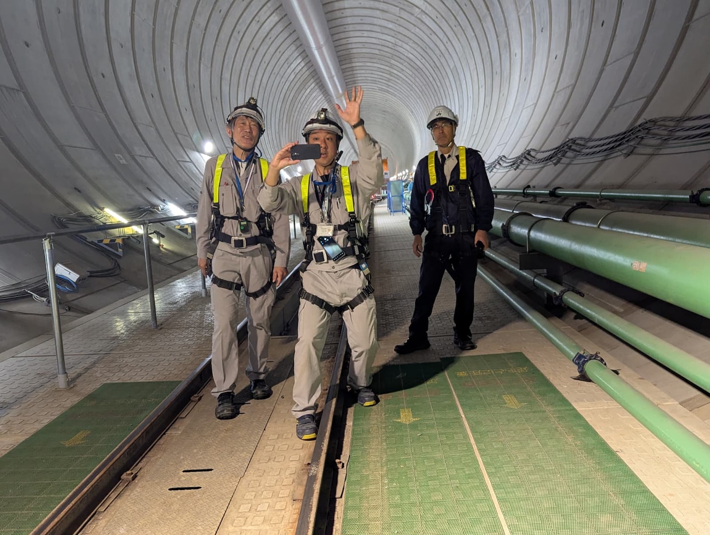 Japanese engineers discussing water resource challenges