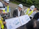Japanese engineers discussing water resource challenges