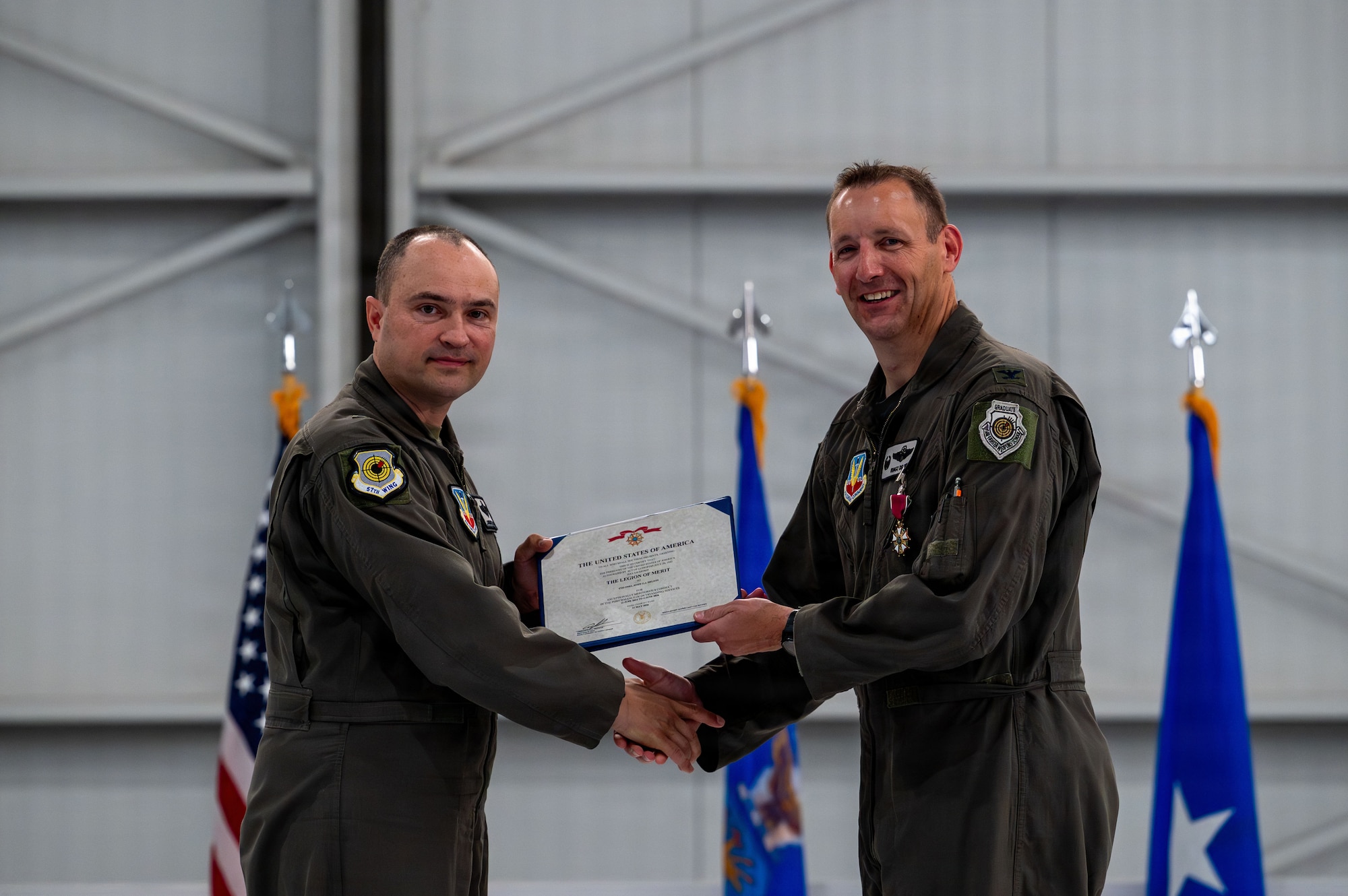 commander receives merit medal