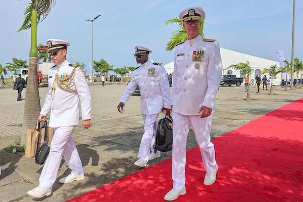 U.S. Navy Rear Adm. Scott W. Ruston, right, Vice Commander of U.S. Naval Forces Africa, and a U.S. Navy delegate, walk down a red carpet during the Nigerian Navy’s International Fleet Review during the Nigerian Navy’s 70th Anniversary Celebration at the Eko Atlantic City Waterfront in Lagos, Nigeria, June 1, 2026.