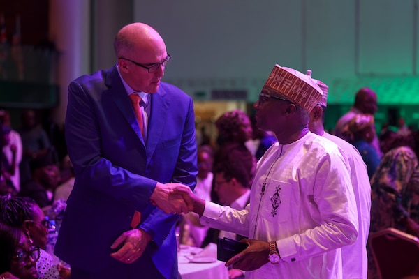 U.S. Navy Rear Adm. Scott W. Ruston, left, Vice Commander of U.S. Naval Forces Africa, shakes hands with Nigerian Navy Rear Adm. Chindo Usman Yahaya, Maritime Security Officer, during a Gala dinner during the Nigerian Navy’s 70th Anniversary Celebration inLagos, Nigeria, June 1, 2026.