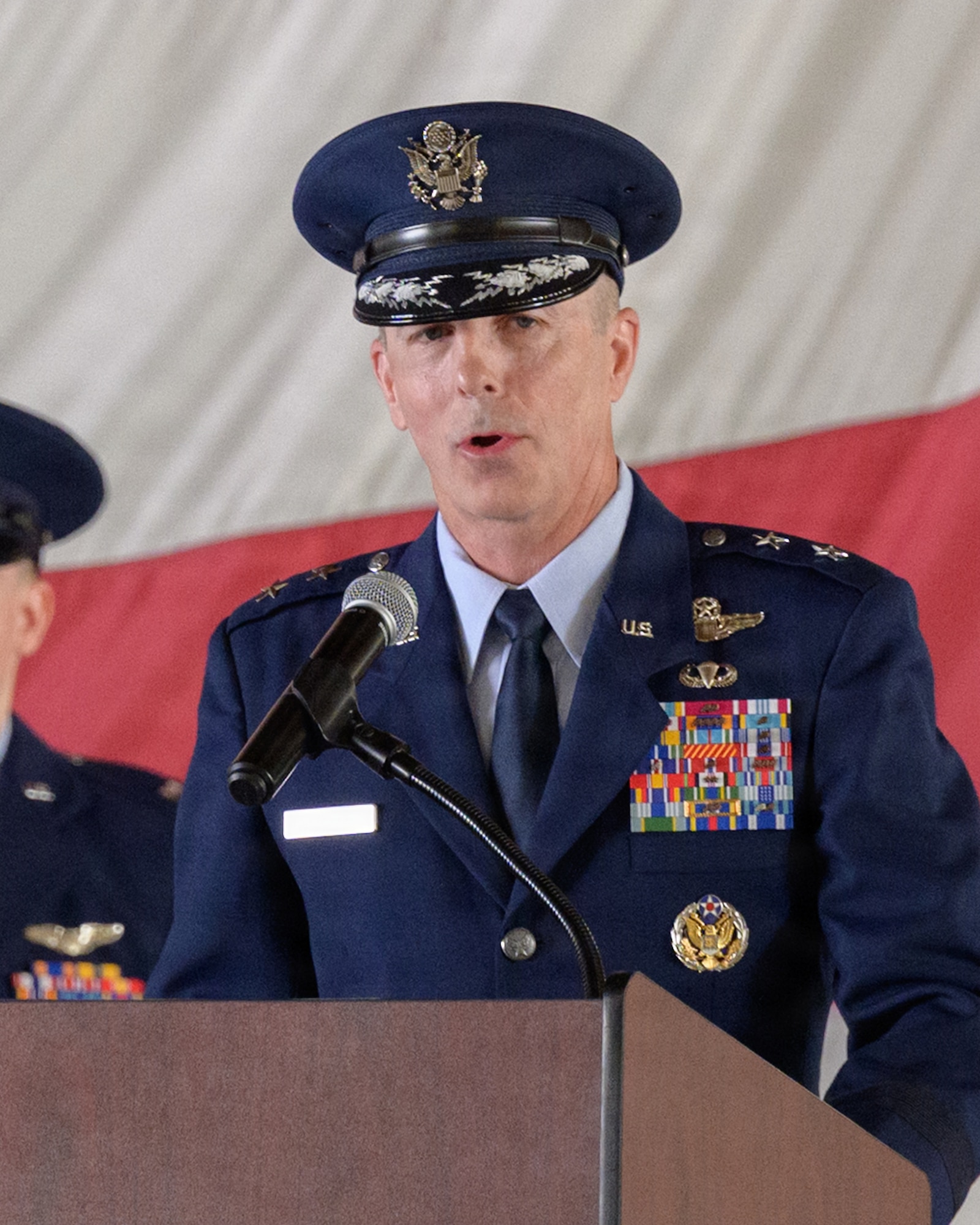 U.S. Force Maj. Gen. Steven G. Behmer, 15th Air Force commander, speaks during the 49th Wing change of command and major command reassignment ceremony at Holloman Air Force Base, New Mexico, June 4, 2026. The 49th Wing has been reassigned to Air Combat Command, optimizing training pipelines for Airmen at the primary F-16 Fighting Falcon and MQ-9 Reaper schoolhouse in the Air Force. (U.S. Air Force photo by Senior Airman Bob Teichmann)