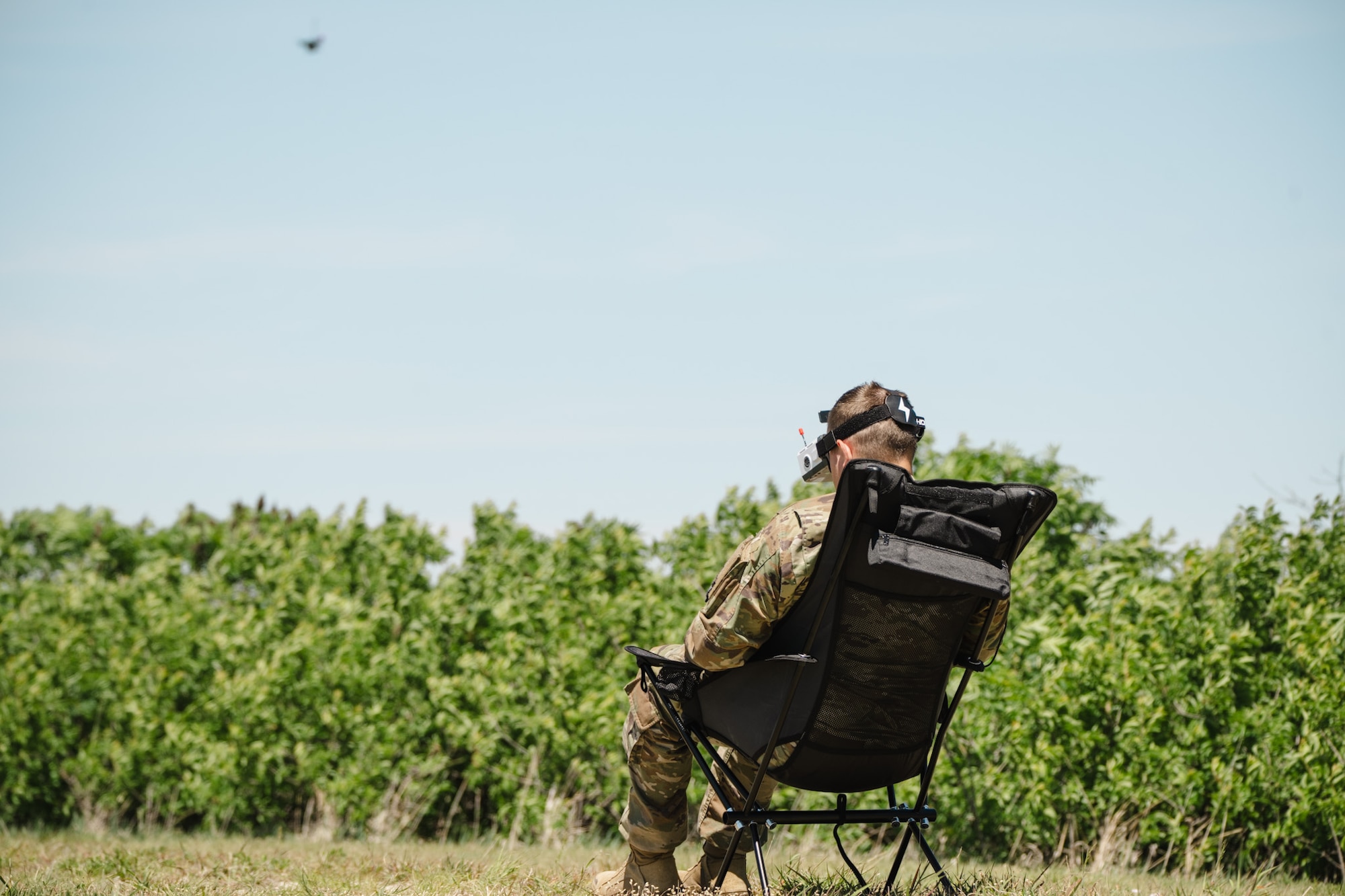 Airmen assigned to the 184th Wing’s Point Defense Battle Lab test autonomous drone swarm capabilities during a live demonstration at Smoky Hill Air National Guard Range near Salina, Kansas, May 7, 2026. Working alongside the PDBL, industry partners demonstrated how they can successfully coordinate up to 1,000 Group 1 unmanned aerial systems (UAS) using a single ground control operator, further showcasing how rapid innovation can counter emerging airborne threats. The demonstration supports Air Combat Command's ongoing initiative to develop tactics and procedures for countering small UAS. (U.S. Air National Guard photo by 1st Lt. Samantha Root)
