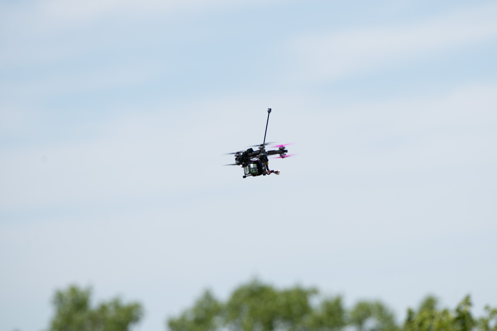 Airmen assigned to the 184th Wing’s Point Defense Battle Lab test autonomous drone swarm capabilities during a live demonstration at Smoky Hill Air National Guard Range near Salina, Kansas, May 7, 2026. Working alongside the PDBL, industry partners demonstrated how they can successfully coordinate up to 1,000 Group 1 unmanned aerial systems (UAS) using a single ground control operator, further showcasing how rapid innovation can counter emerging airborne threats. The demonstration supports Air Combat Command's ongoing initiative to develop tactics and procedures for countering small UAS. (U.S. Air National Guard photo by 1st Lt. Samantha Root)