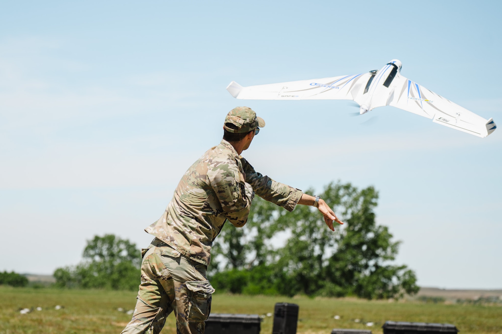 Airmen assigned to the 184th Wing’s Point Defense Battle Lab test autonomous drone swarm capabilities during a live demonstration at Smoky Hill Air National Guard Range near Salina, Kansas, May 7, 2026. Working alongside the PDBL, industry partners demonstrated how they can successfully coordinate up to 1,000 Group 1 unmanned aerial systems (UAS) using a single ground control operator, further showcasing how rapid innovation can counter emerging airborne threats. The demonstration supports Air Combat Command's ongoing initiative to develop tactics and procedures for countering small UAS. (U.S. Air National Guard photo by 1st Lt. Samantha Root)