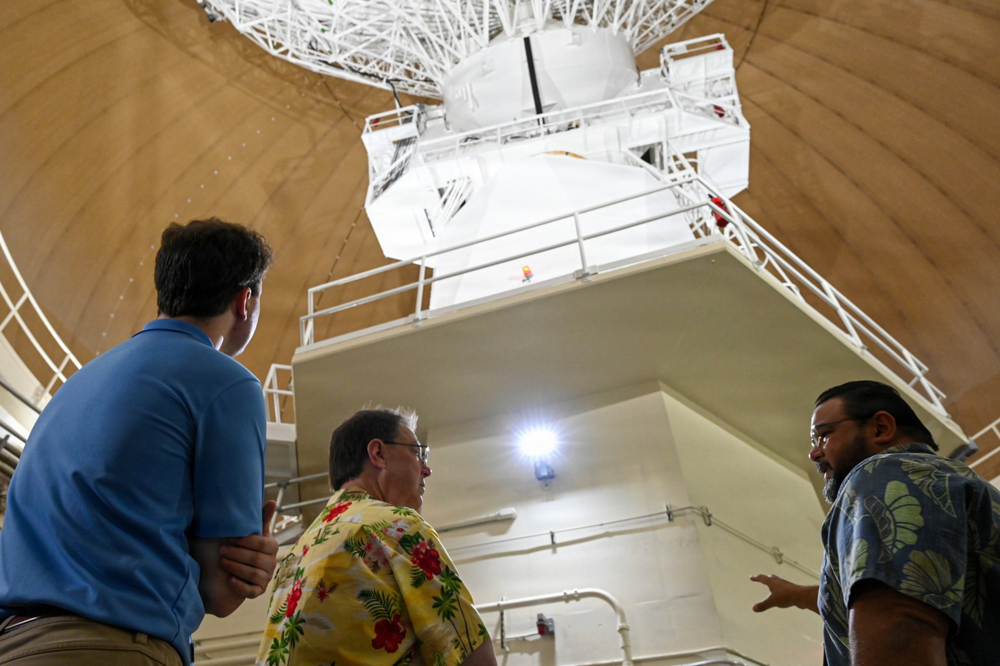 Participants from the Mississippi College tour group view the inside of a radar dome.
