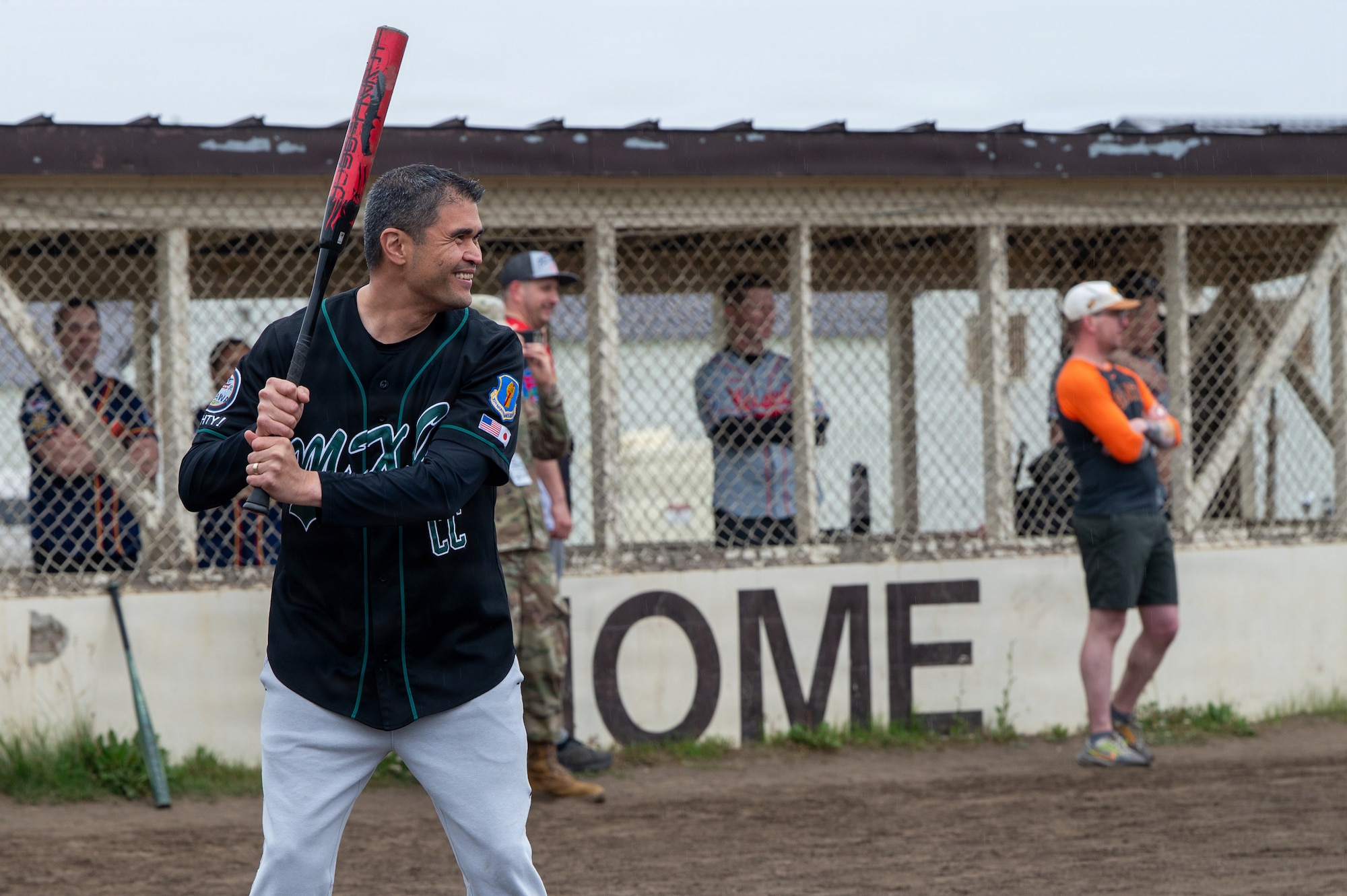 U.S. Air Force Col. Bryan Wong, 35th Maintenance Group commander, competes in a softball game at the 2026 Sakura Olympics