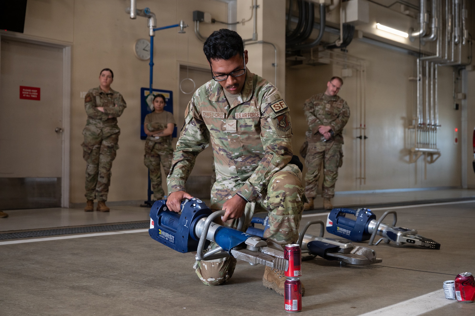 U.S. Air Force Airman 1st Class Kriss Chavez-Cruz, 35th Security Forces Squadron patrolman, operates hydraulic rescue equipment during the Wild Weasel immersion tour