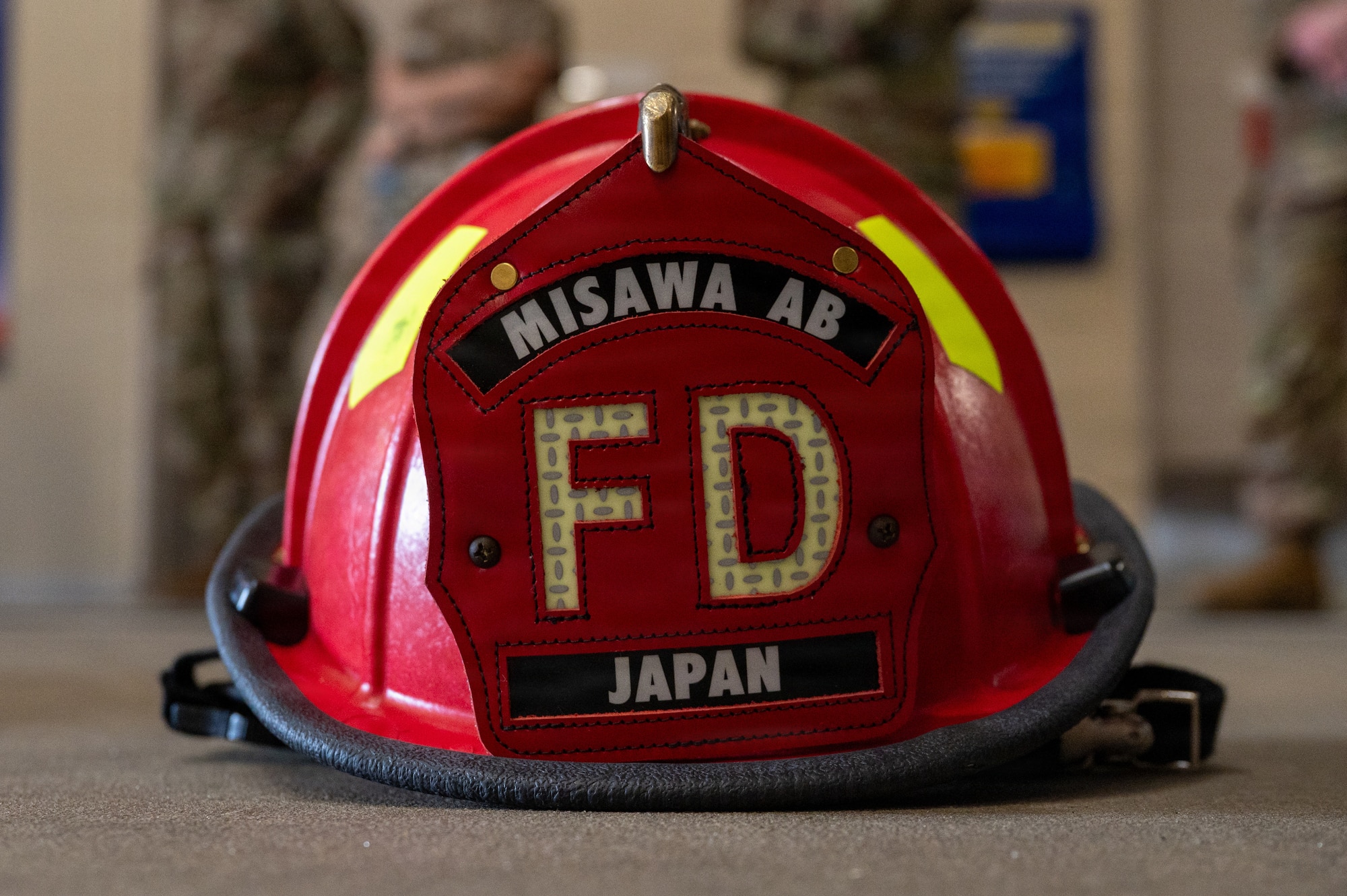 A Misawa Air Base Fire Department firefighter helmet at Fire Station 1 during a Wild Weasel immersion tour