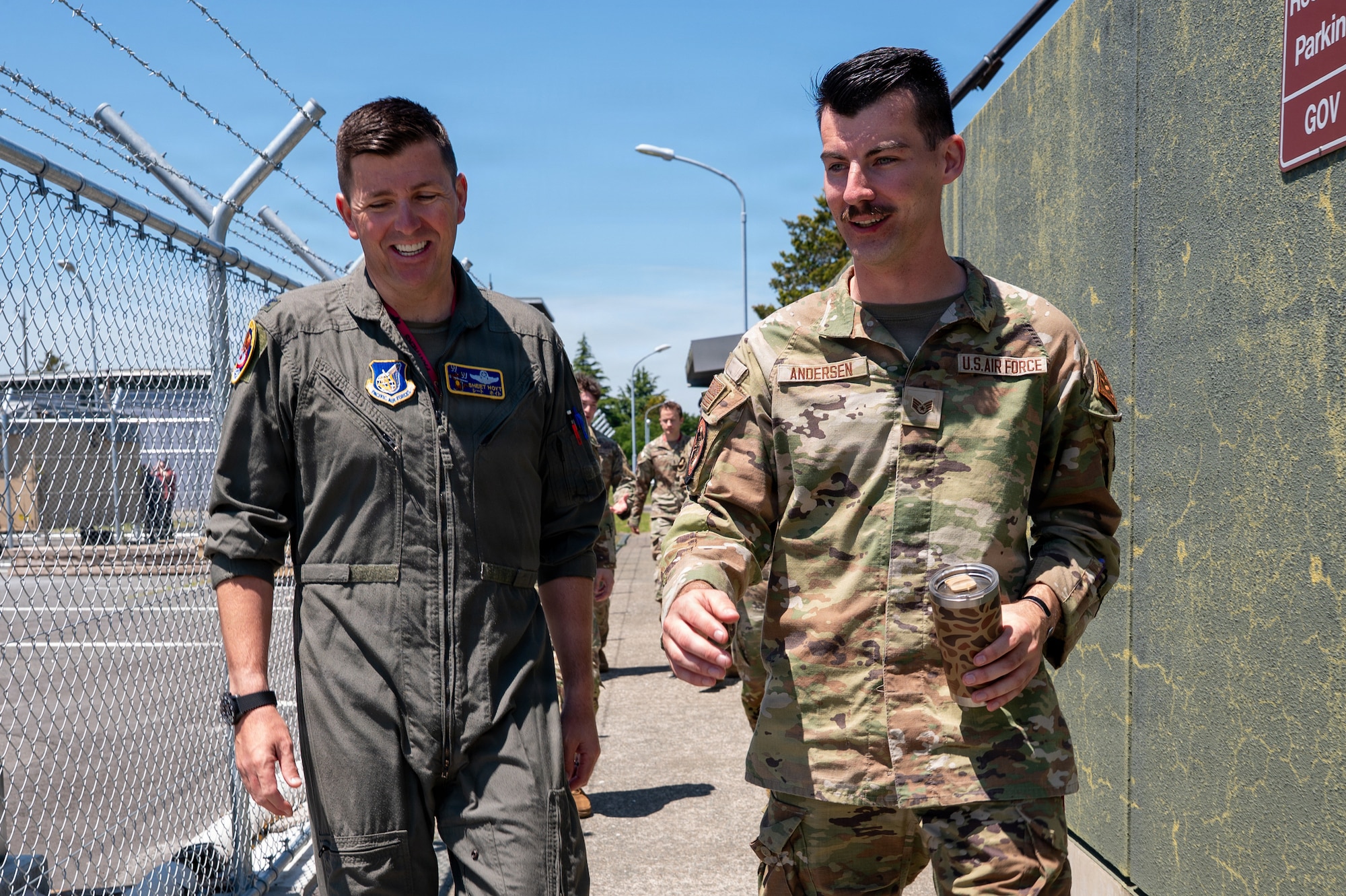 U.S. Air Force Staff Sgt. Daniel Andersen, right, 13th Fighter Squadron intelligence noncommissioned officer in charge, walks with Col. Matthew Hoyt, 35th Fighter Wing deputy commander, during a Wild Weasel Walk-Through