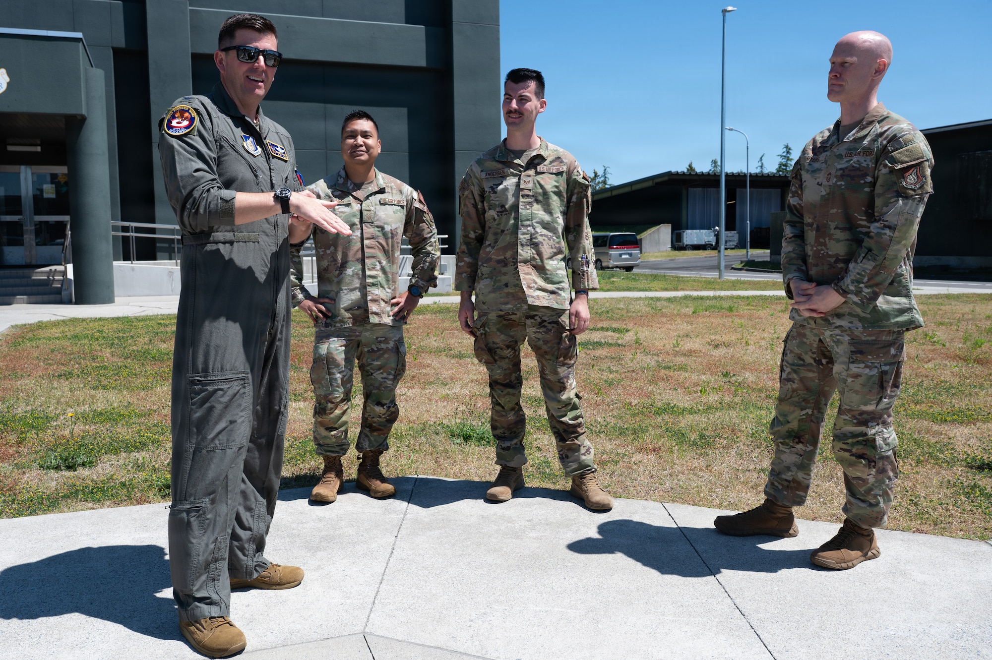U.S. Air Force Staff Sgt. Daniel Andersen, 13th Fighter Squadron intelligence noncommissioned officer in charge (NCOIC), welcomes wing leaders during a Wild Weasel Walk-Through