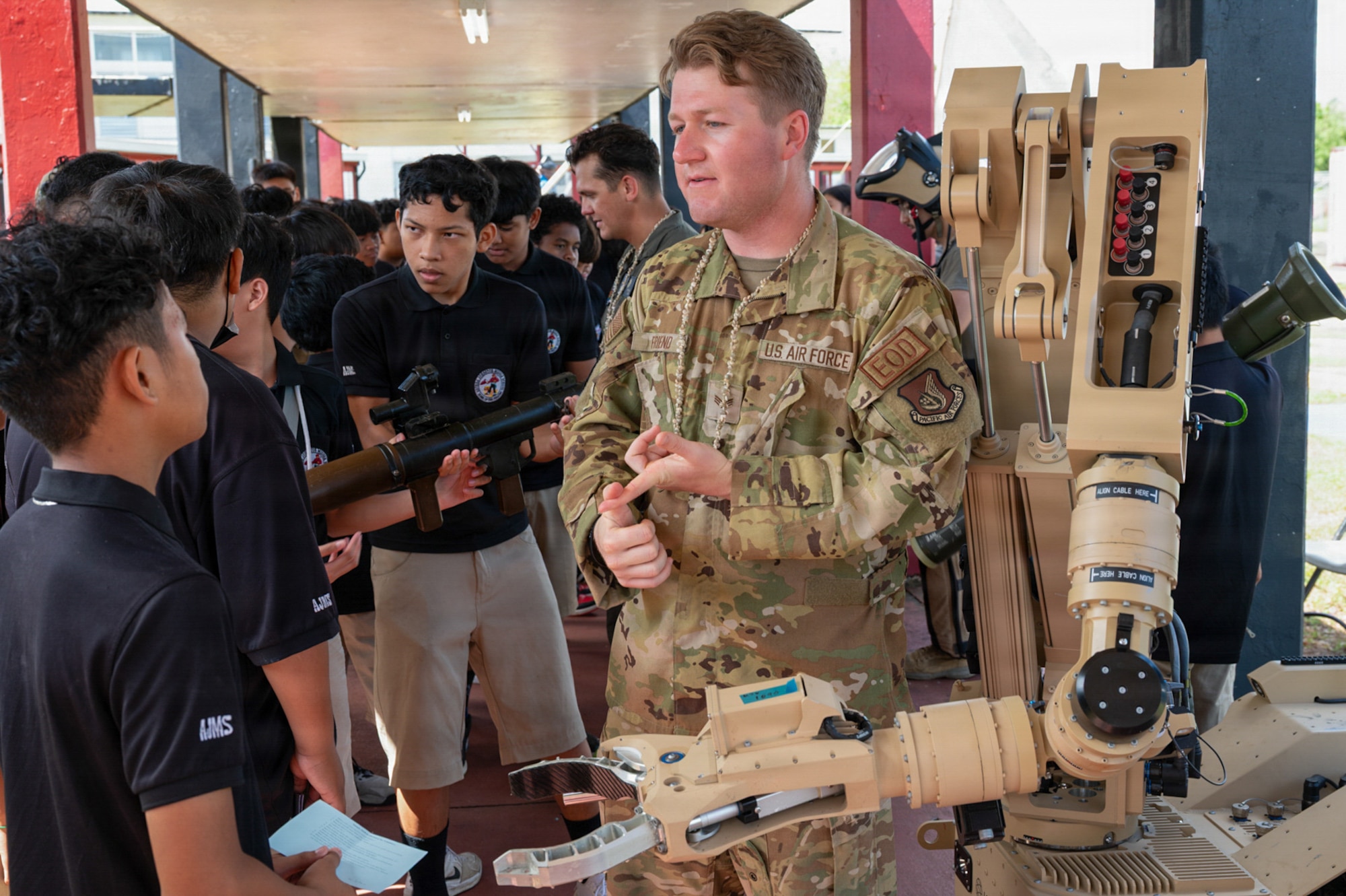 U.S. Air Force Senior Airman Kyler Friend, 36th Civil Engineer Squadron explosive ordnance disposal technician, explains how EOD technicians use robots to remotely respond to hazards.